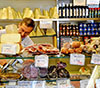 Sample Italian cheeses, prosciutti, salami and even olive oil