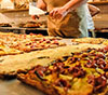 Taste his mouthwatering pizza